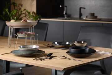 kitchen utensils on a wooden table, modern kitchen