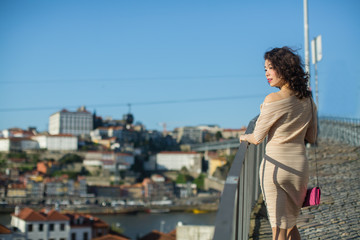 Beautiful asian woman on a street in old Porto downtown. Multicultural Portugal.