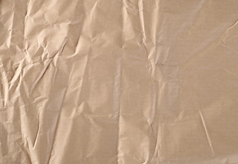 Crumpled brown decorative paper texture and background