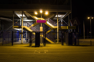 entrance to a grandstand of a large stadium at night, Gelredome in Arnhem