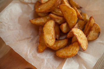 French fries on wooden table