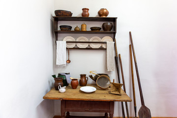 Fototapeta na wymiar Vintage kitchen utensils in a Russian hut
