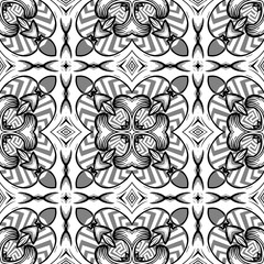 Black and white vintage floral vector seamless pattern. Greek ornamental background. Repeat tribal ethnic style  backdrop. Geometric greek key meanders design with grunge flowers, leaves, shapes