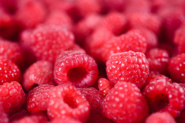Fresh raspberries background closeup.