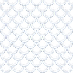 Seamless lacy pattern in fish scale design. © troyka