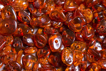 Lot of loose beads of natural Baltic amber, close up