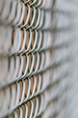Close up of a green cyclone fence