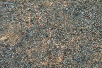 Sea pebbles under water