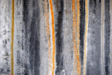 Naklejka premium Bright texture of a concrete wall with rusty streaks. Vintage effect.