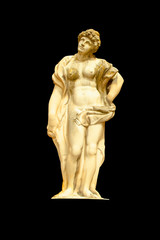 Fototapeta na wymiar Goddess of love in antique mythology Aphrodite (Venus). Ancient statue isolated on black background. Vertical image.