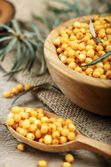 sea buckthorn in a plate and in a spoon