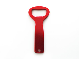 Front and vertical view of red bottle opener isolated on white background. Close up of Beer opener.