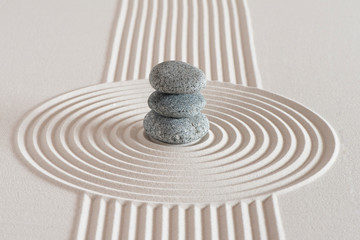 Japanese zen garden with stone in textured white sand - obrazy, fototapety, plakaty