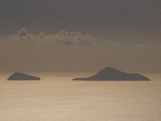 Fototapeta premium Panoramic view of the Aegean Sea and islands from the top of the mountain Mesa Vouno, on the island of Santorini, Greece.