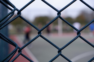 defocused basketball court in sunny day