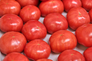 Background and texture of red tomatoes.