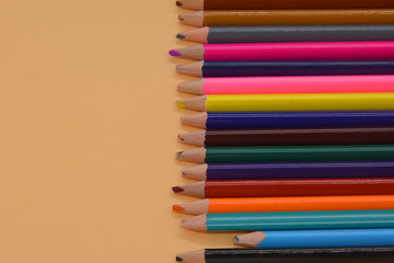 short dove pencil in a crowd of multi-colored pencils. Minimal creative concept. Leadership, independence, think differently, business success concept
