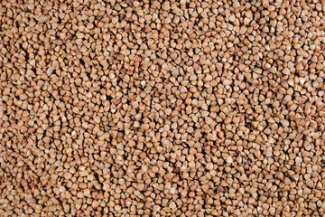 Texture of premium buckwheat. Background of buckwheat.