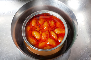 can of Serbian beans in hot water