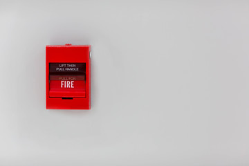 Fire alarm box on cement wall for warning and security system in the condominium place. standard safety in the resident, shopping mall and public place concept. image for copy space, background.