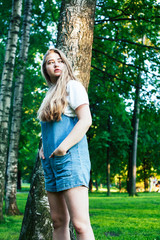 young pretty sensual girl with fashion makeup posing in birch tree forest, lifestyle people concept