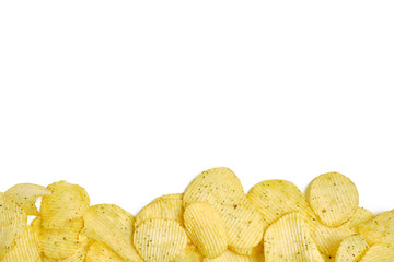 Corrugated chips at the bottom of the frame on a white background. Top view. Copy space.