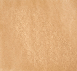 texture of light brown smooth parchment paper, full frame