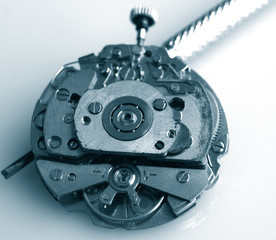 close up pic of vintage chronograph watch mechanism