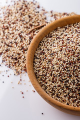 mix of quinoa grains on white acrylic background