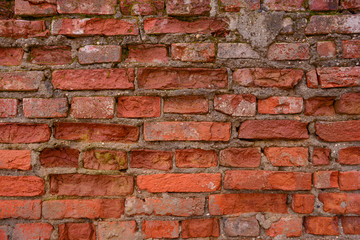 texture of the wall made of red old brick
