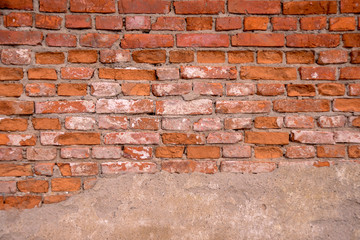 texture of the wall made of red old brick