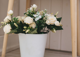 Beautiful wedding bouquets in  white basket. Floristry concept.