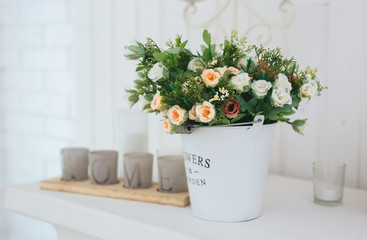 Beautiful wedding bouquets in  white basket. Floristry concept.