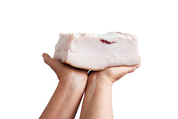 Village lard is isolated on a white background. To keep fat fresh pork fat in his hands.