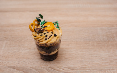 A beautiful and mouth-watering close-up trifle on a table with space for a signature. Cake