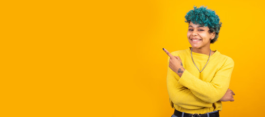 young african american girl or woman isolated on color background with space for advertisement or text