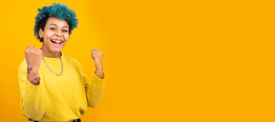 young african american girl or woman isolated on color background with space for advertisement or text