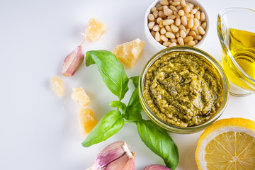 Delicious traditional Italian pesto sauce on a white background