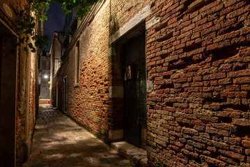 Old Brickwall in a narrow Alley in Cannaregio District, Venice/Italy