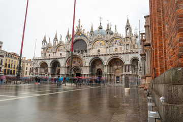 Fototapeta na wymiar The St. Mark's Square in Venice during Bad Weather and High Tide, Venice/Italy