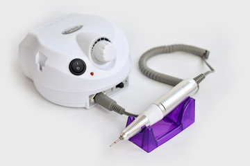 White cutter for manicure on a white background