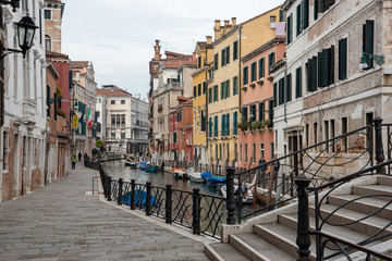 Fototapeta na wymiar Empty Pathway and Canal in Dorsoduro Quarter, Venice/Italy