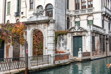 Fototapeta na wymiar Entrance of an old baroque Palace in Dorsoduro Quarter, Venice/Italy