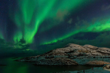 Fototapeta na wymiar Northern lights on the arctic sky