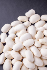 fresh organic natural beans on black background