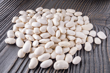 Fresh organic natural beans on wooden rustic background