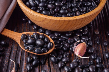 Fresh organic natural beans on wooden rustic background