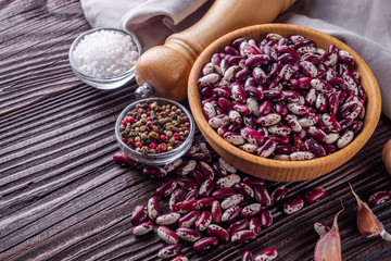 Fresh organic natural beans on wooden rustic background