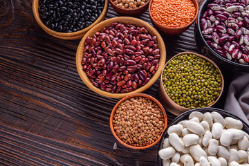 Fresh organic natural beans on wooden rustic background