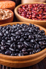 Fresh organic natural beans on wooden rustic background
